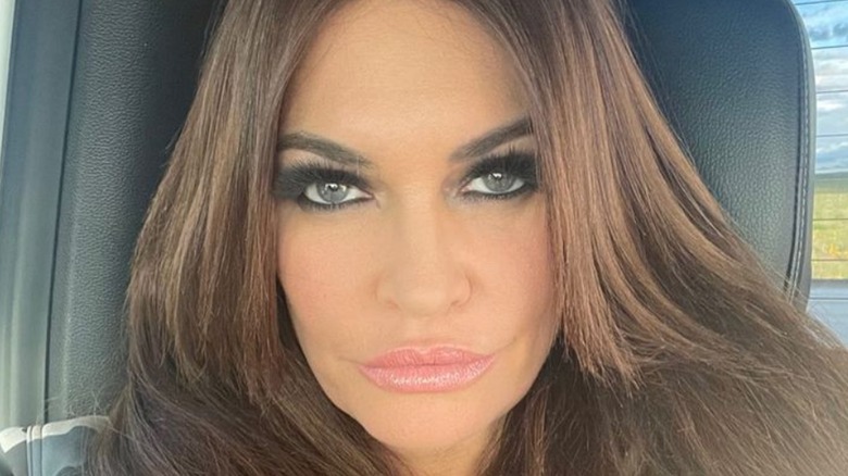 Kimberly Guilfoyle false eyelashes pouting