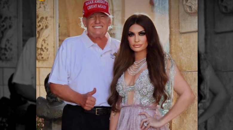 Donald Trump posing with Kimberly Guilfoyle