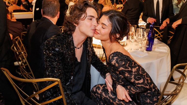 Timothee Chalamet and Kylie Jenner kissing at the 81st Golden Globe Awards in Beverly Hills (2024)