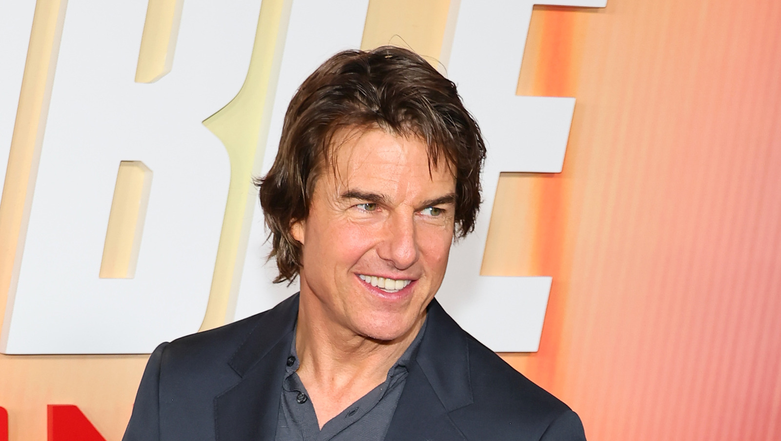 5 Times Tom Cruise’s Signature Dreamy Hair Flopped