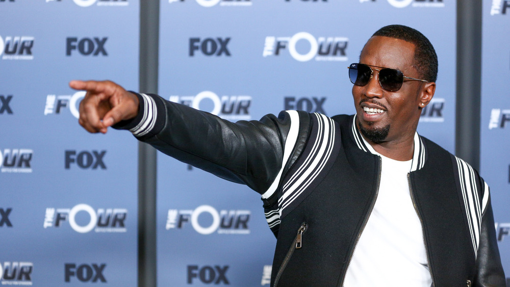 Diddy pointing off-camera