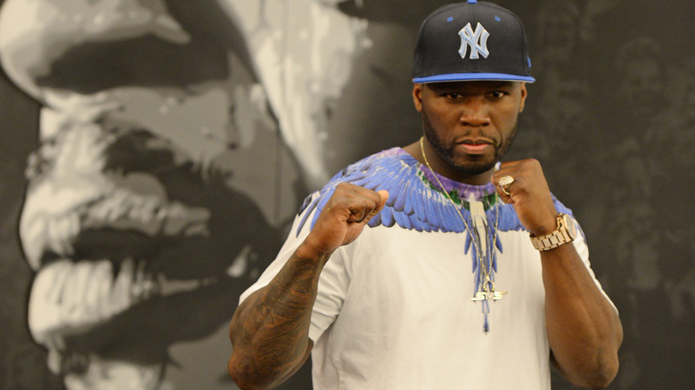 50 Cent holding up fists