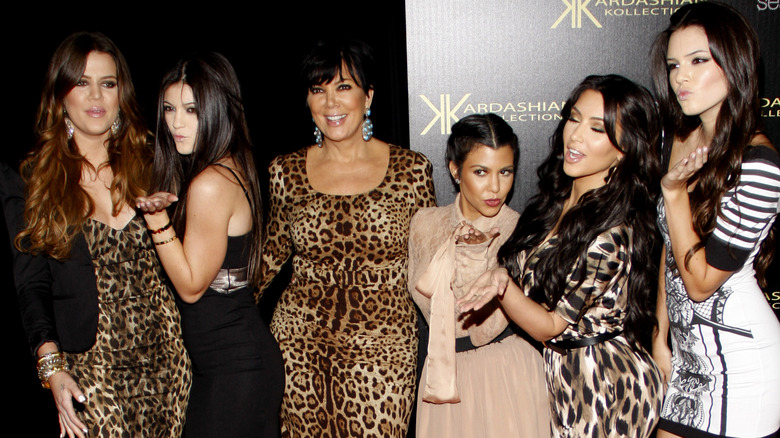 Kardashian-Jenner family blowing kisses to the camera