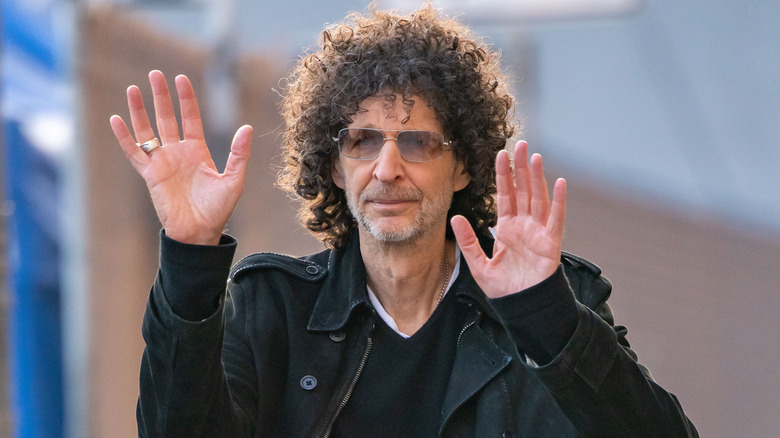 Howard Stern black jacket sunglasses