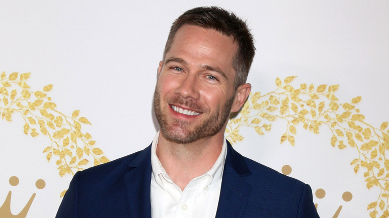 Luke Macfarlane smiling