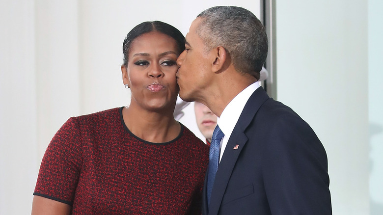 Barack Obama kisses Michelle on the cheek