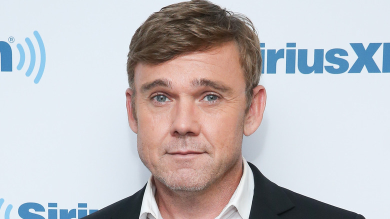 Rick Schroder wearing a suit