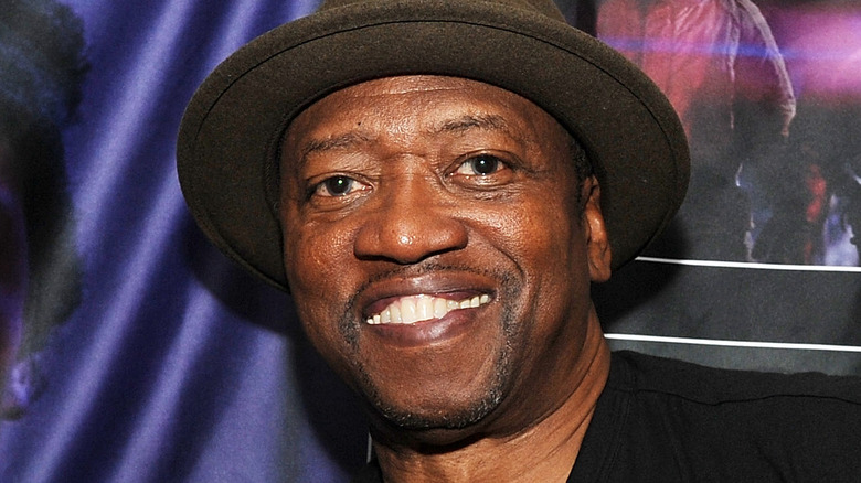 T.K. Carter wearing a hat