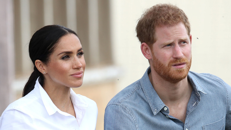 Meghan Markle and Prince Harry sitting down.