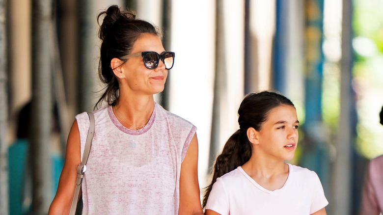 Katie Holmes and Suri Cruise walking