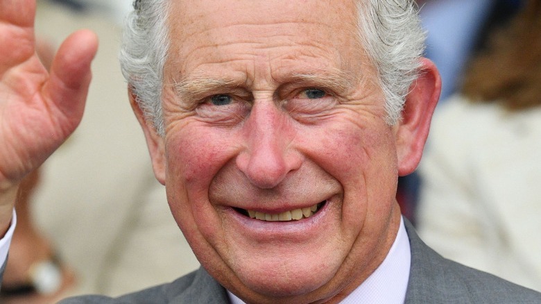 King Charles III smiling