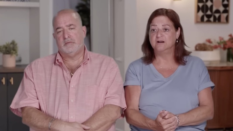 Marlene and Bryan Goldstone talk to the camera