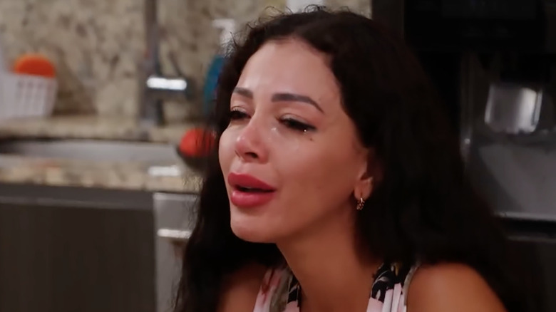 Jasmine Pineda crying in kitchen