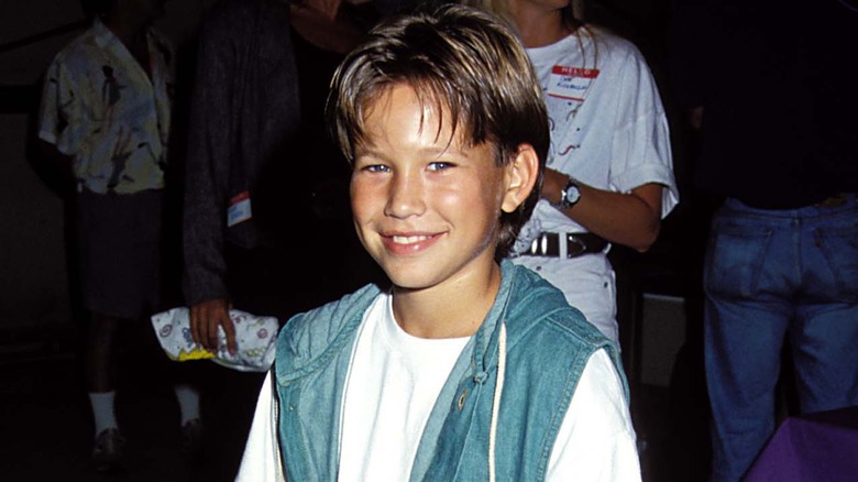 Jonathan Taylor Thomas smiling