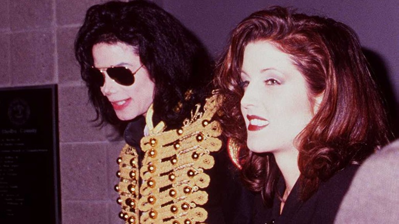 Michael Jackson and Lisa Marie Presley smiling 