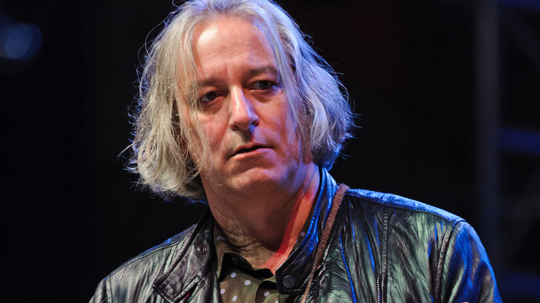 Peter Buck playing guitar 