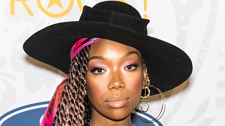 Brandy wearing a black hat