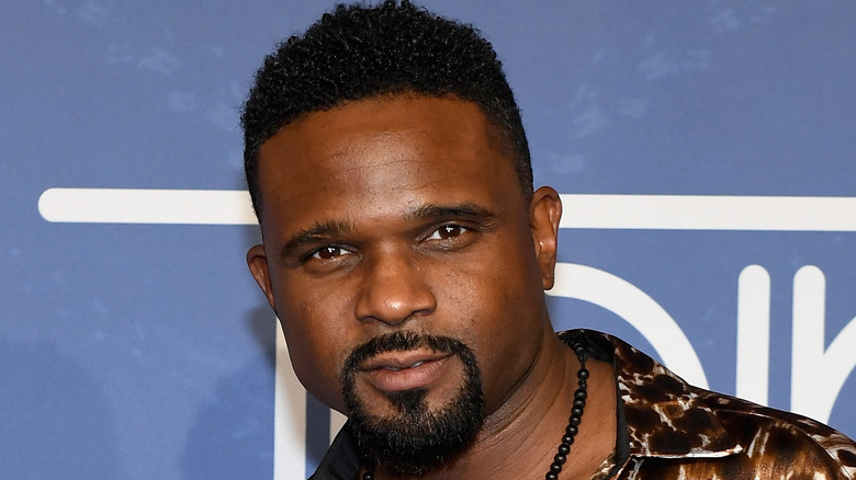 Darius McCrary wearing a beaded necklace