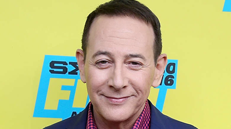 Paul Reubens smirking at camera