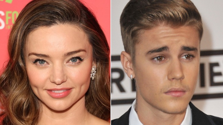 Miranda Kerr smiling, Justin Bieber squinting