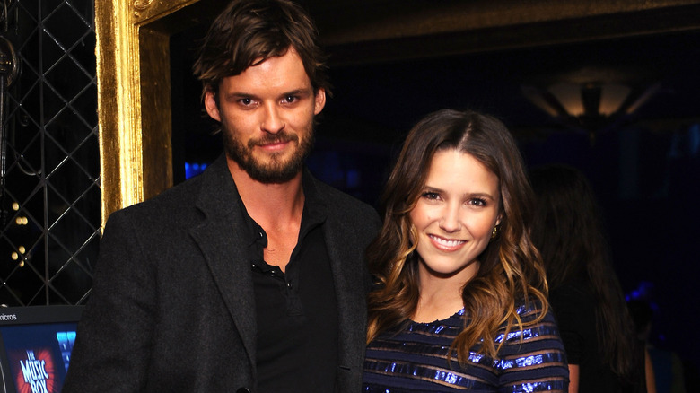 Austin Nichols and Sophia Bush smiling