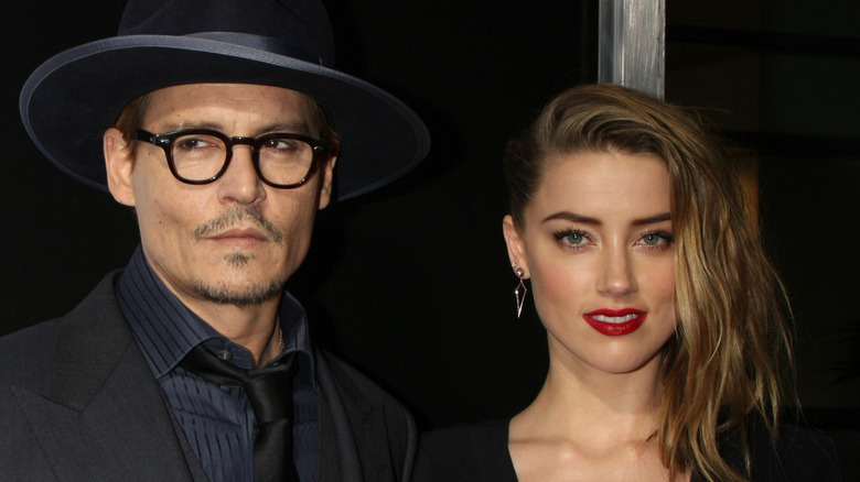 Johnny Depp and Amber Heard posing together