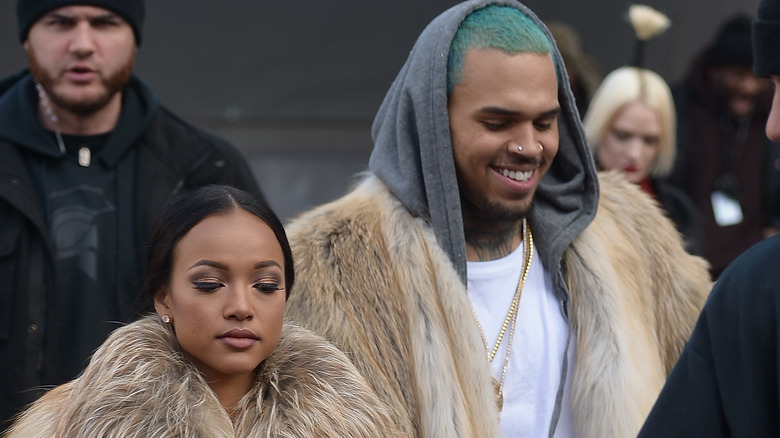 Karrueche Tran and Chris Brown, both walking