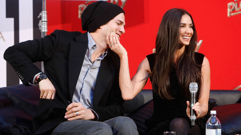 Demi Moore grabbing Ashton Kutcher