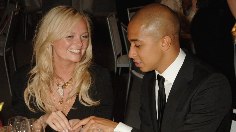 Emma Bunton sitting with Jade Jones