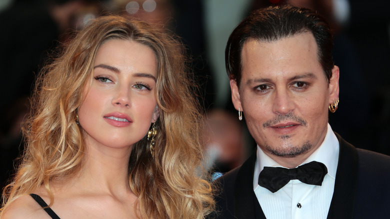 Amber Heard and Johnny Depp at an event 