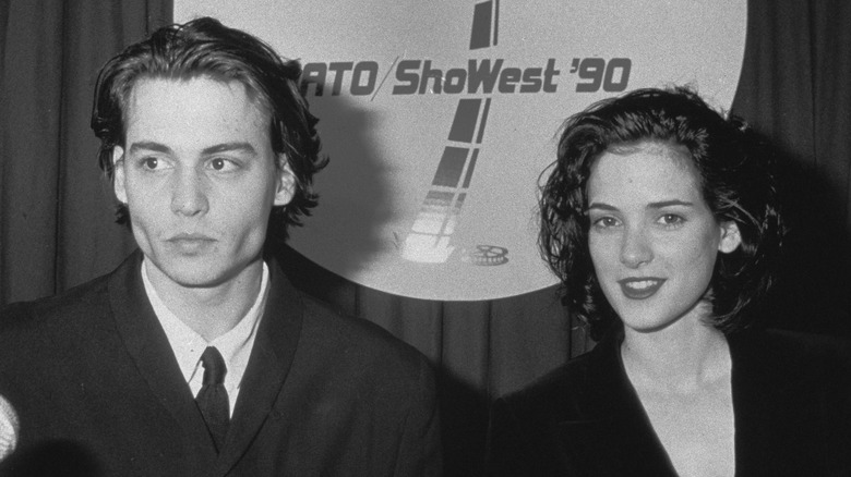 Johnny Depp and Winon Ryder at a press event 