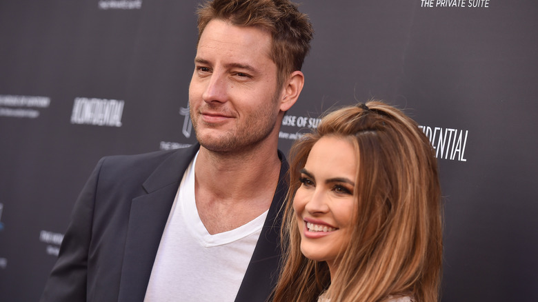 Justin Hartley with Chrishell Stause at an event