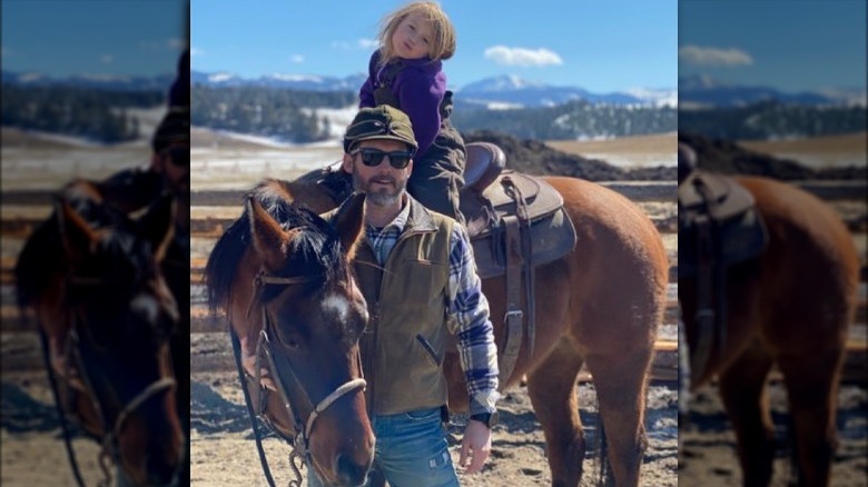 Brandon Blackstock with daughter River on a horse