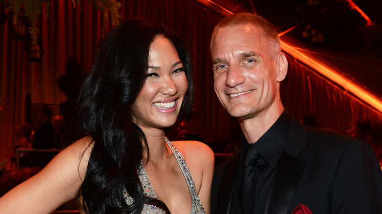 Kimora Lee Simmons smiling with Tim Leissner