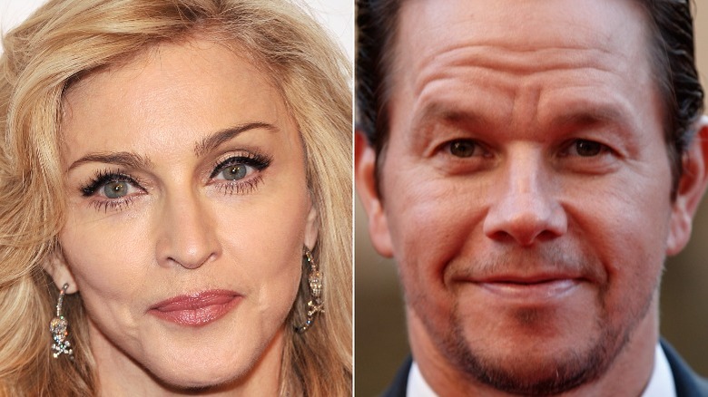 Madonna on red carpet, Mark Wahlberg smiling