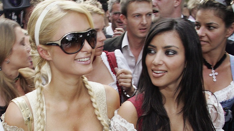 Kim Kardashian and Paris Hilton walking