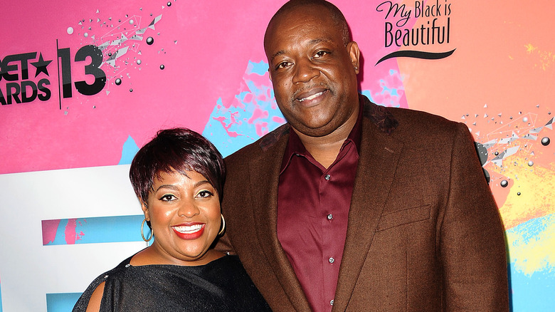 Sherri Shepherd and Lamar Sally pose on red carpet