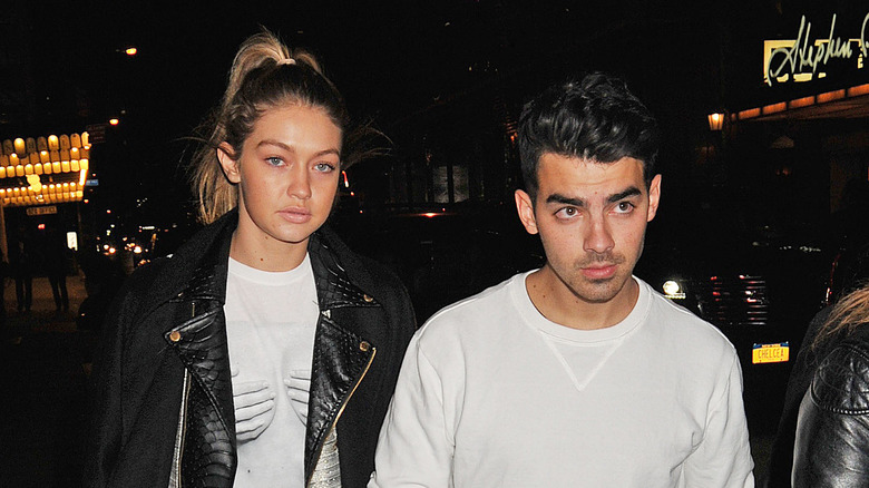 Gigi Hadid and Joe Jonas outside