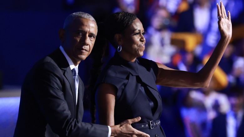 Barack Obama and Michelle Obama speak on stage during the Democratic National Convention in Chicago, IL (2024)