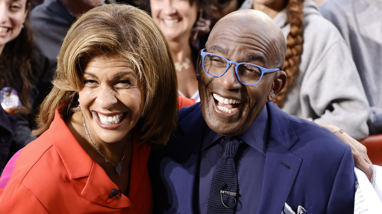 Hoda Kotb and Al Roker laugh side by side