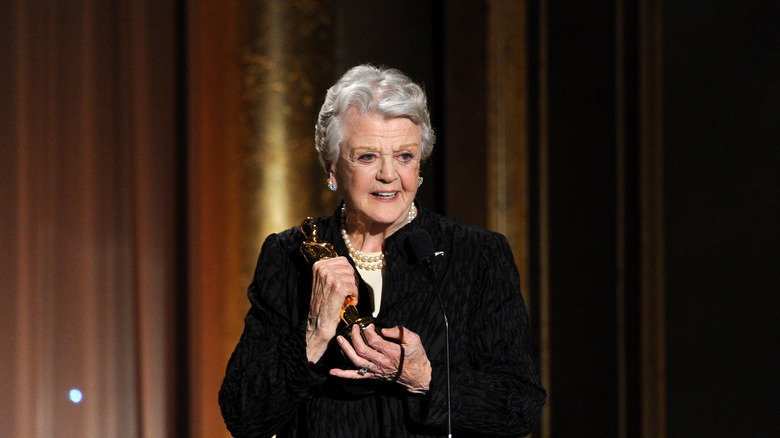 Angela Lansbury accepting her Oscar