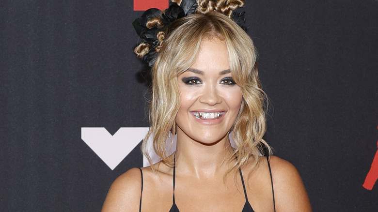 Rita Ora grins at the VMAs