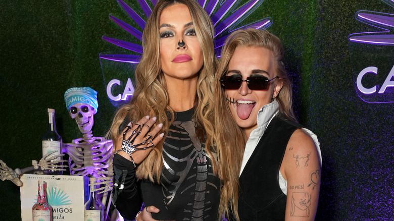 Chrishell Stause and G Flip attending a Halloween party