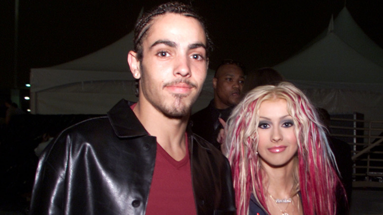 Jorge Santos walking with Christina Aguilera