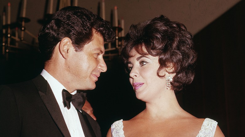 Eddie Fisher gazing at Elizabeth Taylor