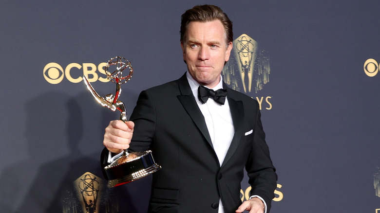 Ewan McGregor holding Emmy award