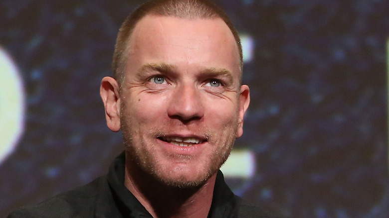 Ewan McGregor smiling shaved head