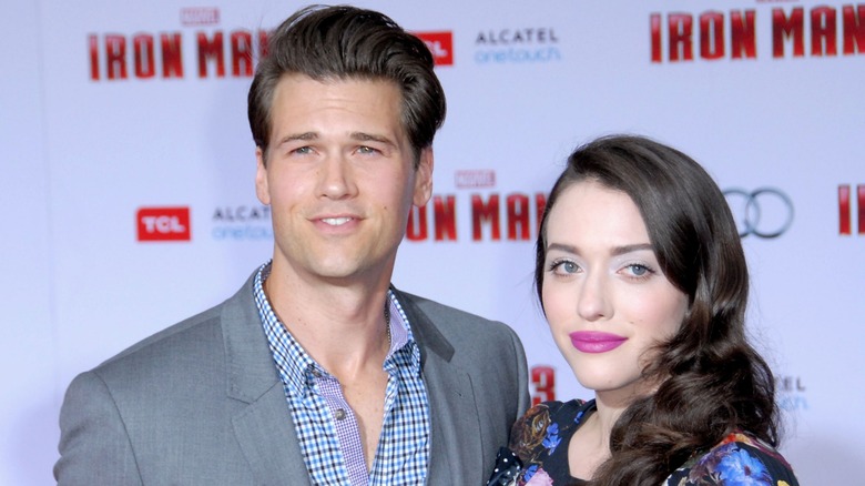 Kat Dennings and Nick Zano pose at an MCU event