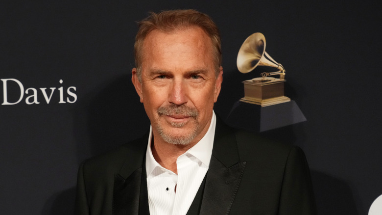 Kevin Costner smirking