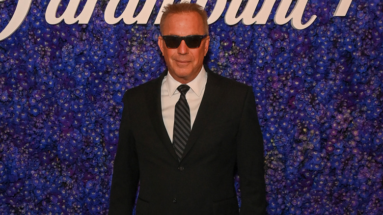 Kevin Costner wearing shades